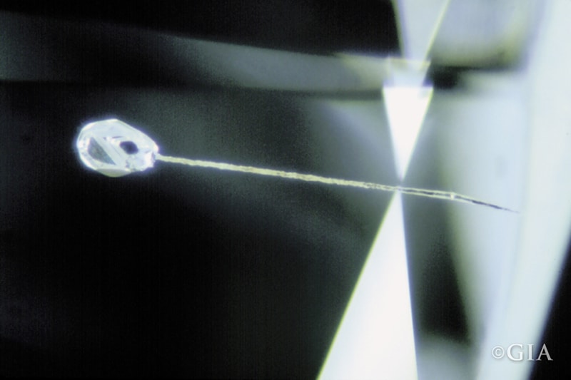 Laser drill hole in diamond